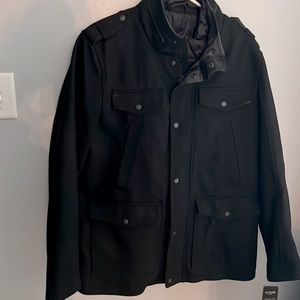 Guess —- Black Peacoat with dual interior. Never worn! Tags on!